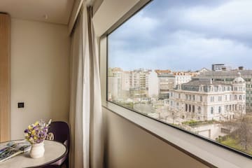 a window with a view of a city