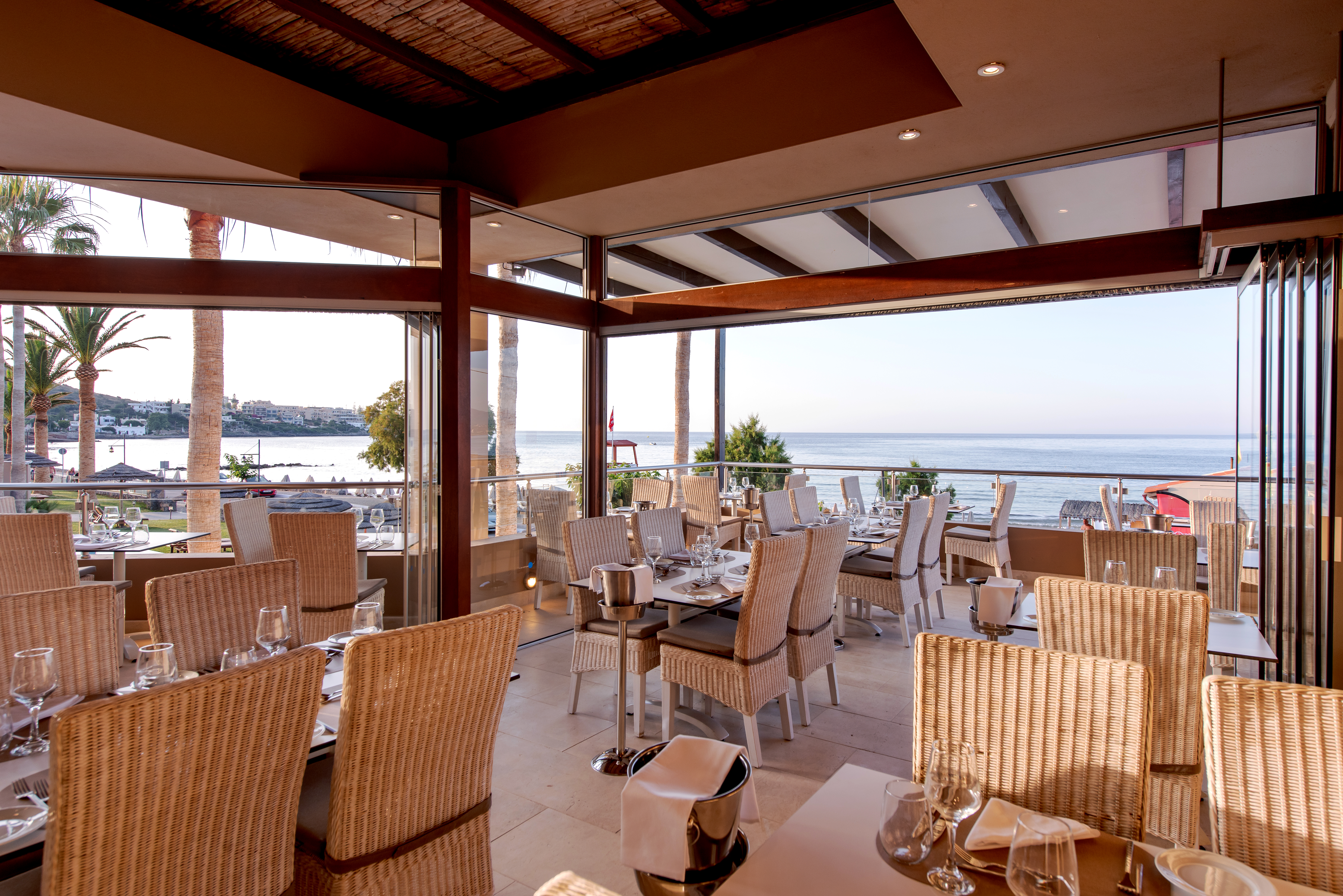 a restaurant with a view of the ocean