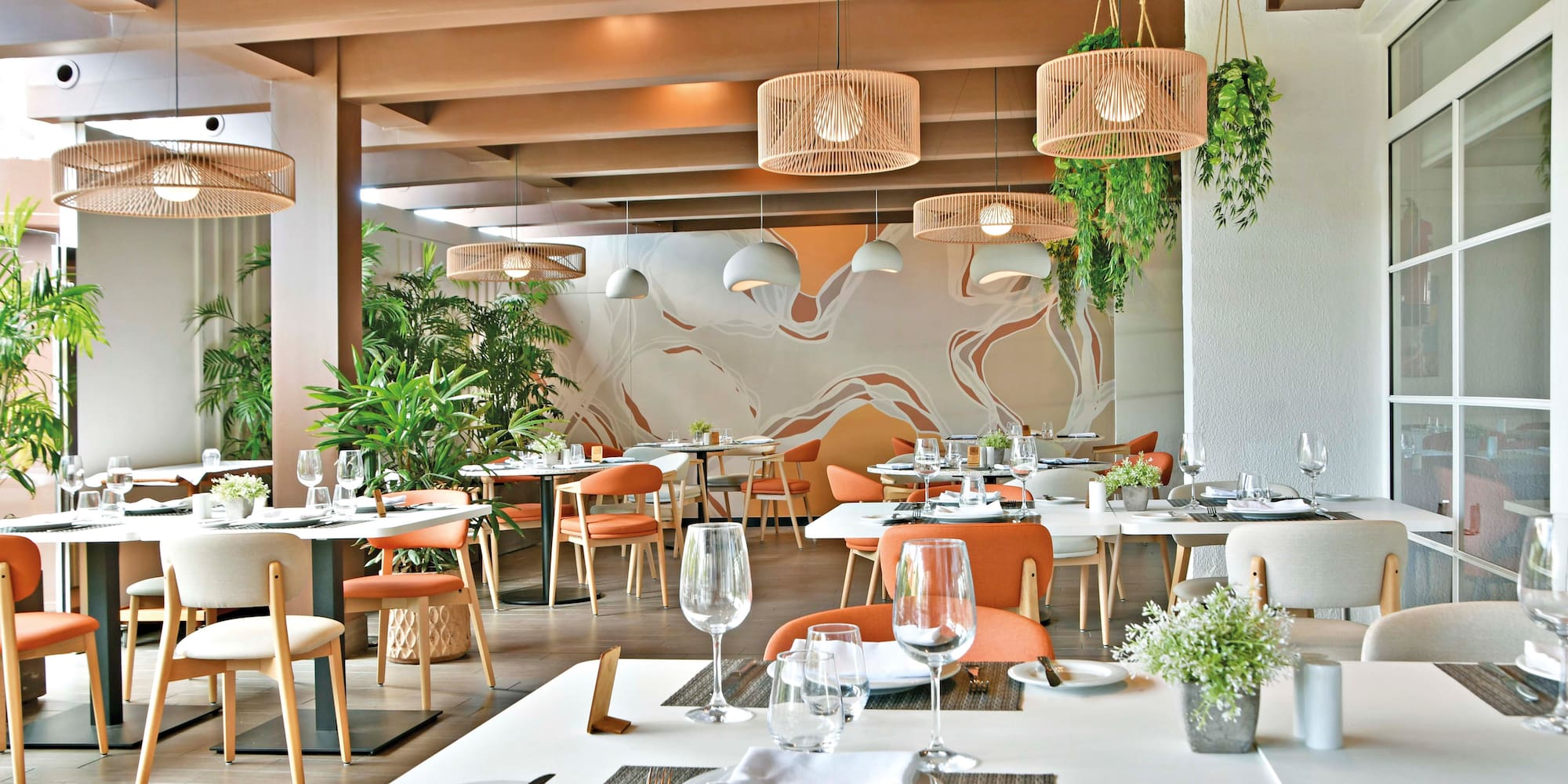 a restaurant with tables and chairs