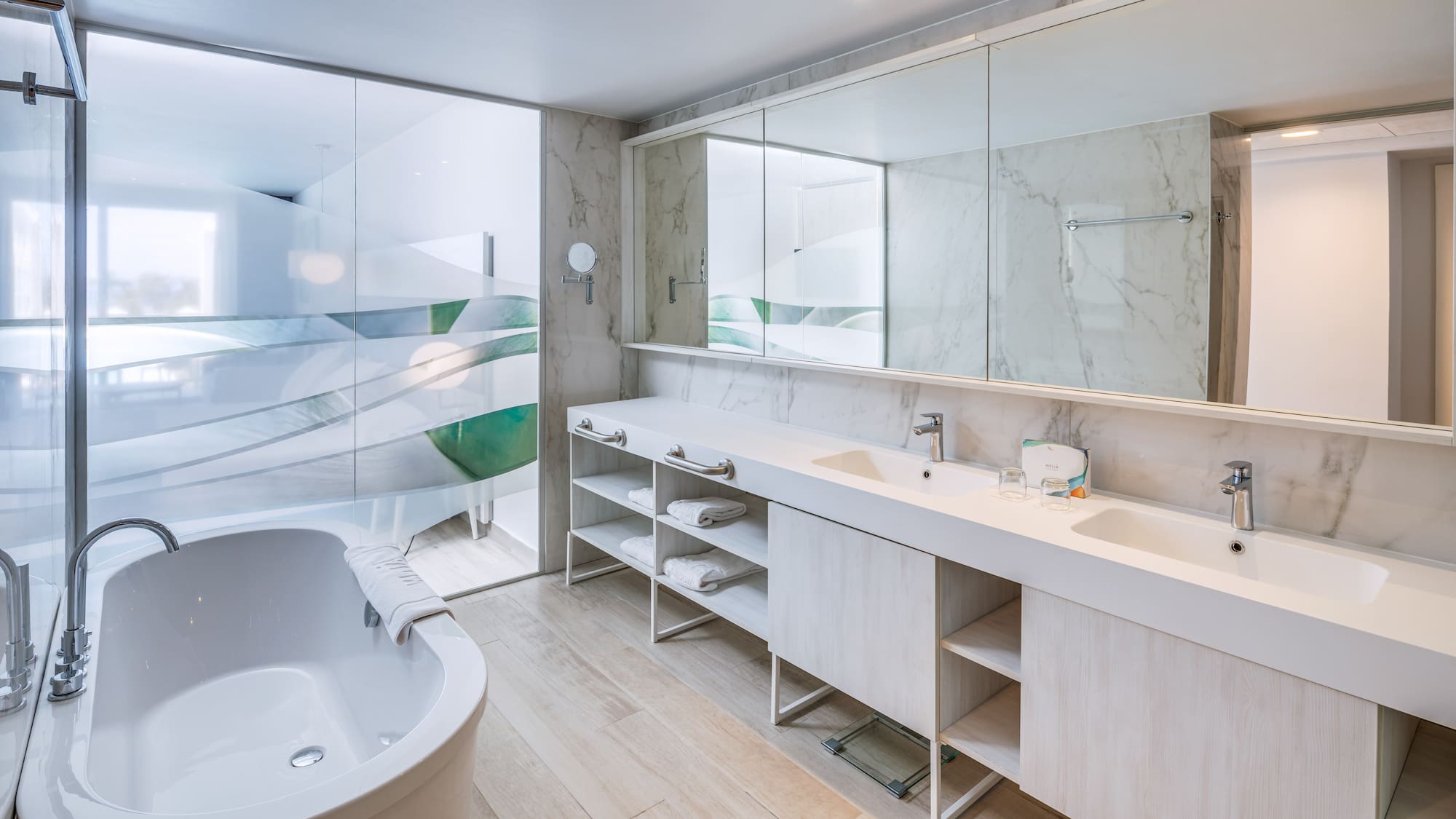 a bathroom with a tub and a tub