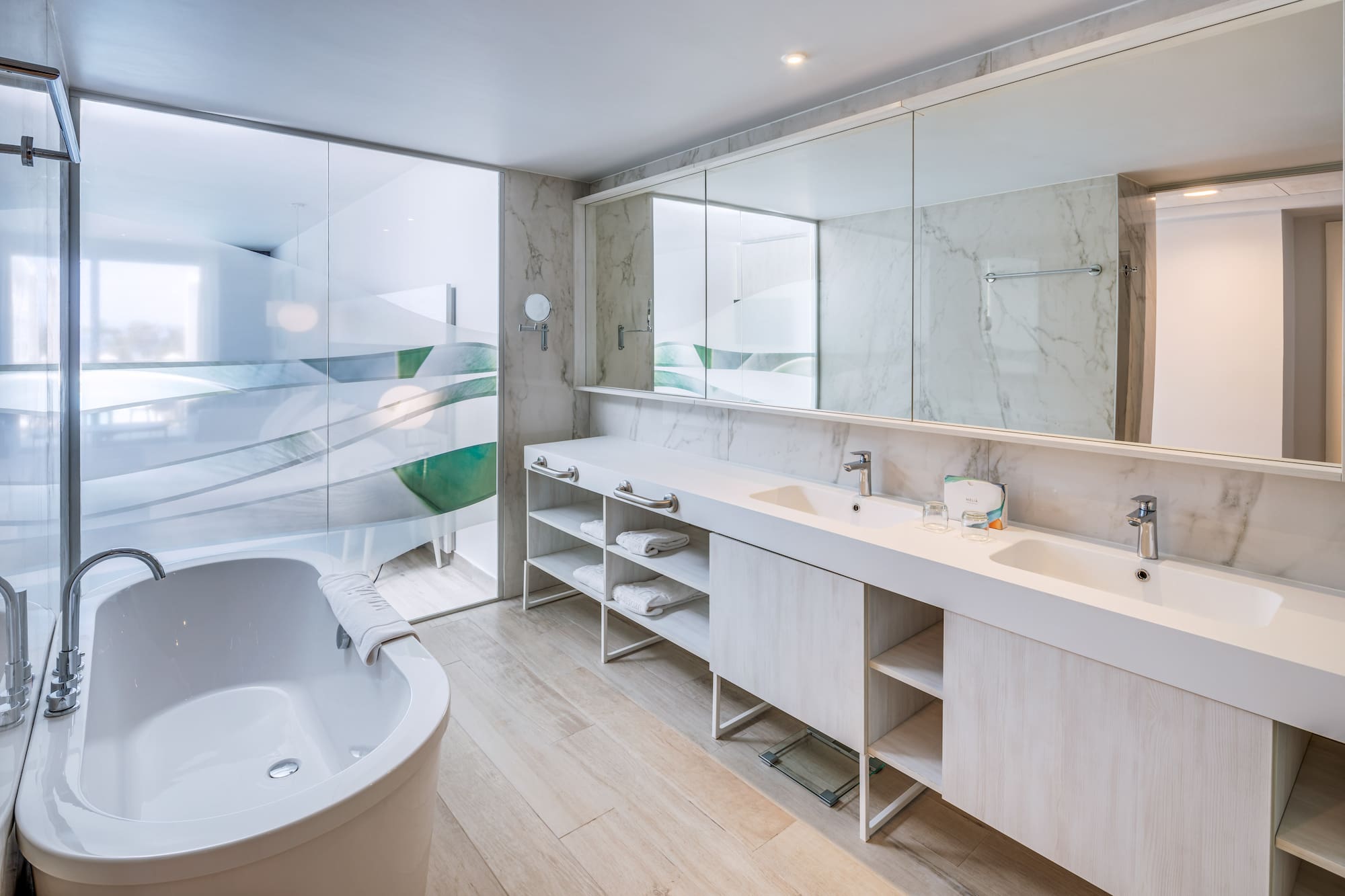 a bathroom with a tub and a tub