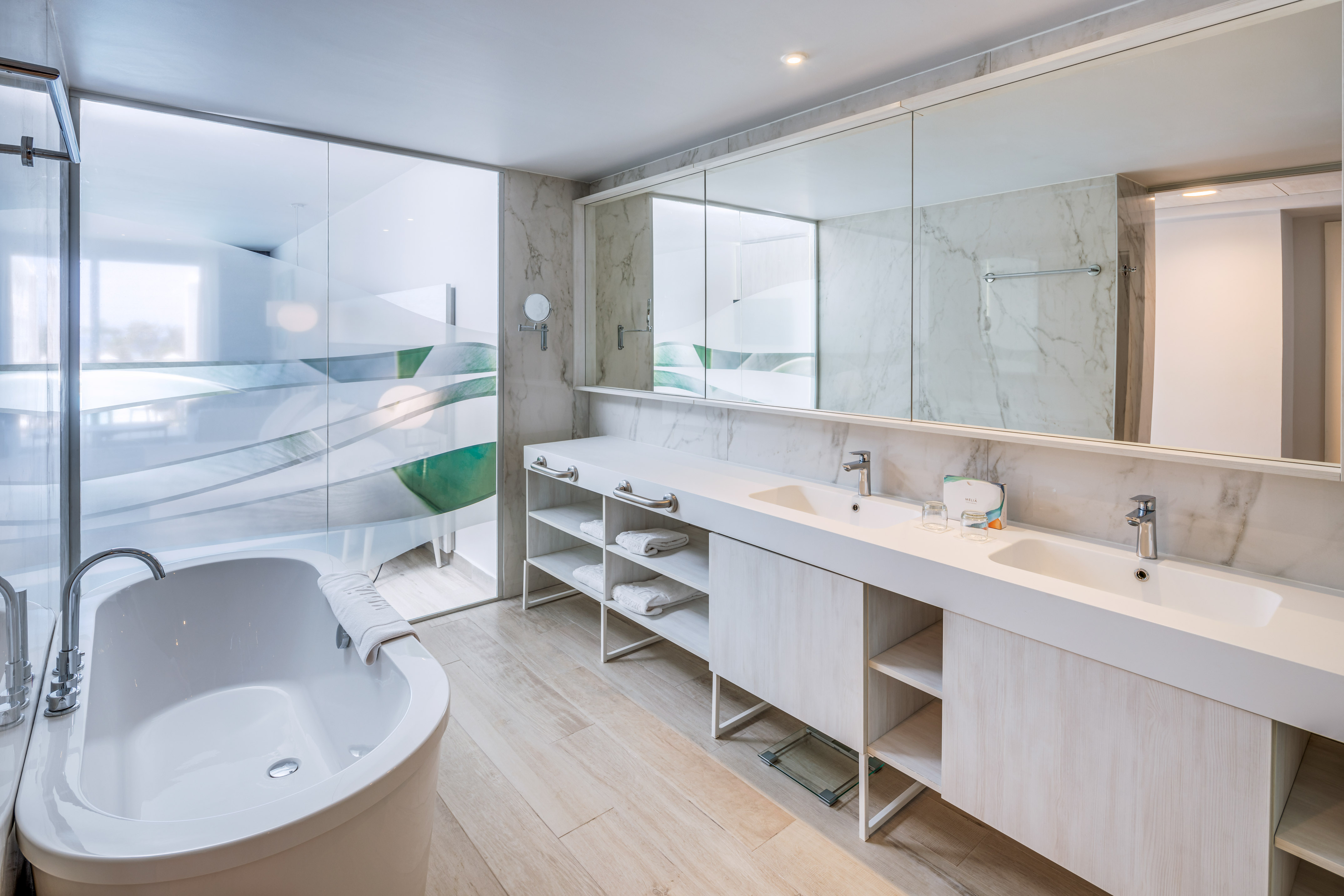 a bathroom with a tub and a tub