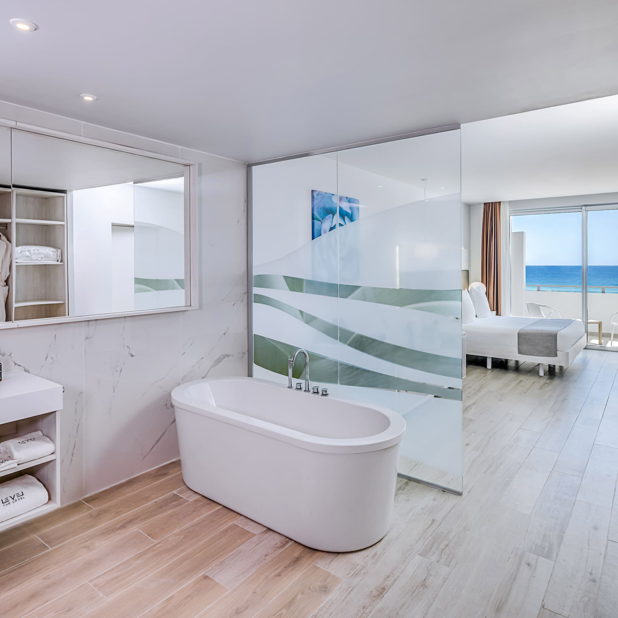 a bathroom with a bathtub and a mirror