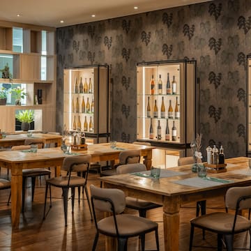 a room with tables and chairs