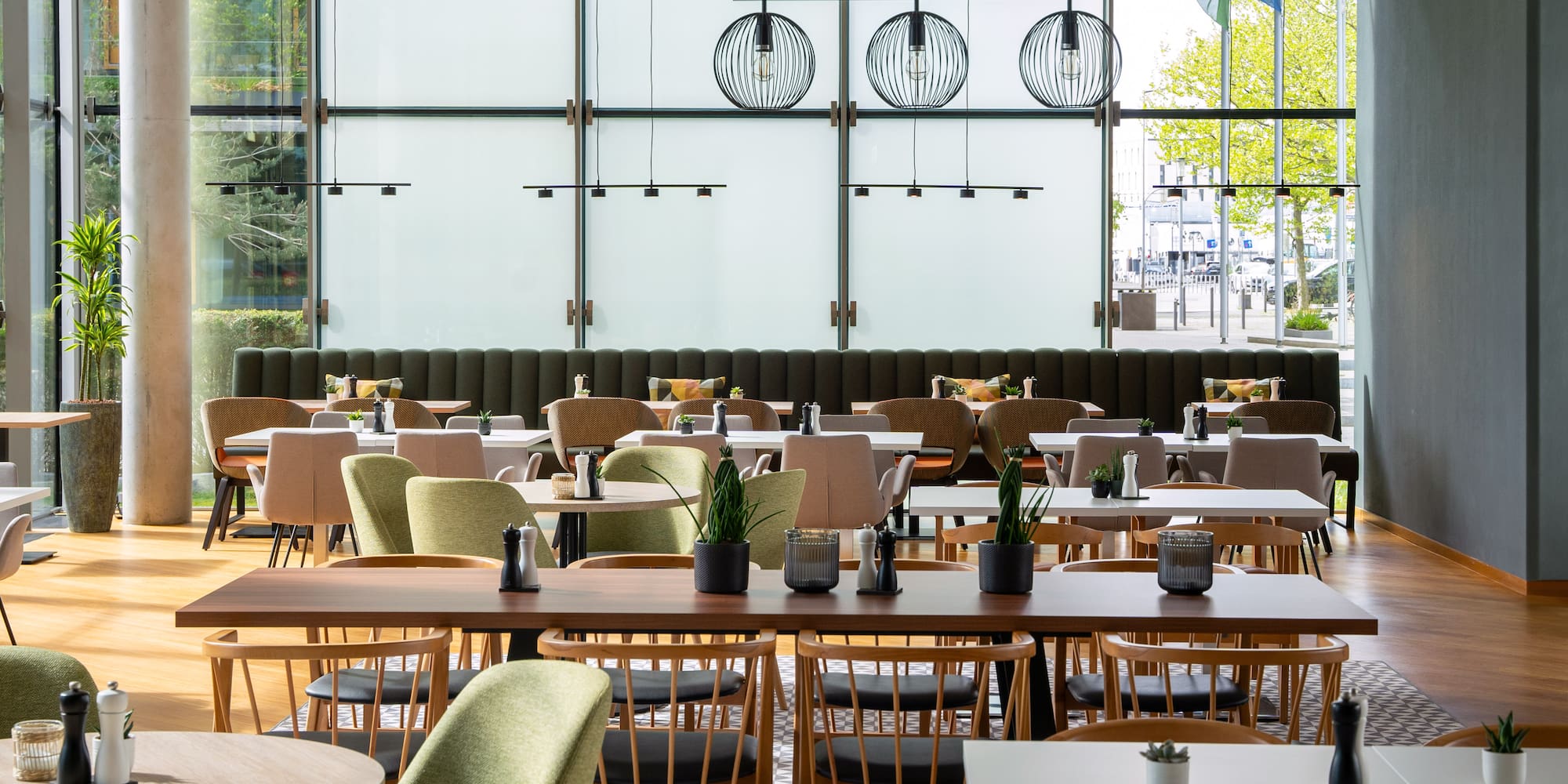 a restaurant with tables and chairs
