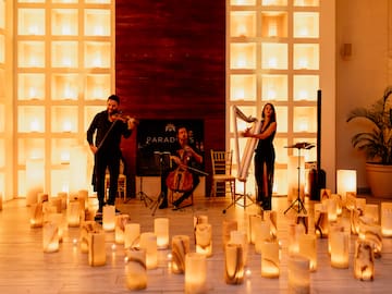 a group of people playing instruments and a group of people on a stage