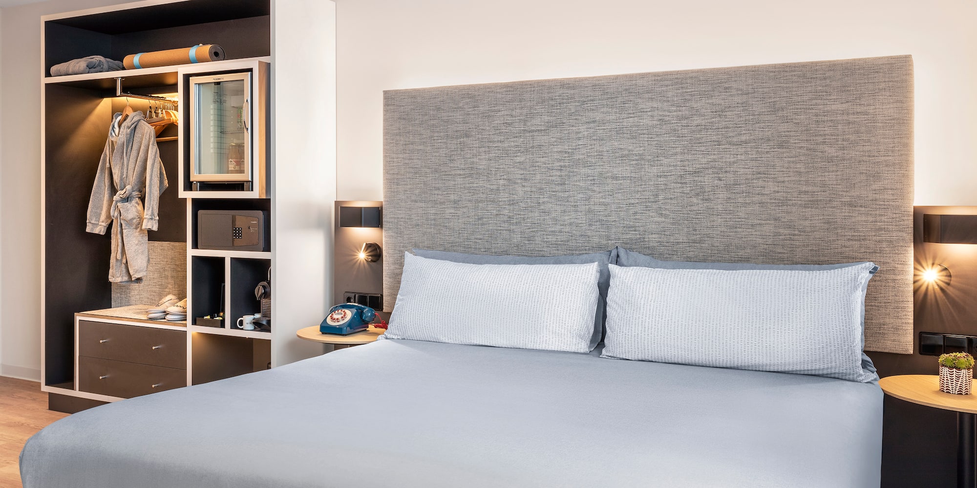 a bed with a headboard and a shelf