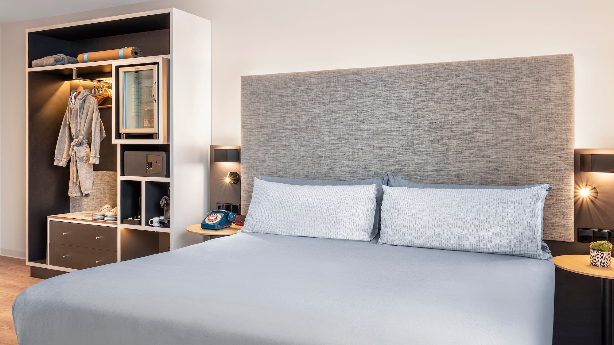 a bed with a headboard and a shelf