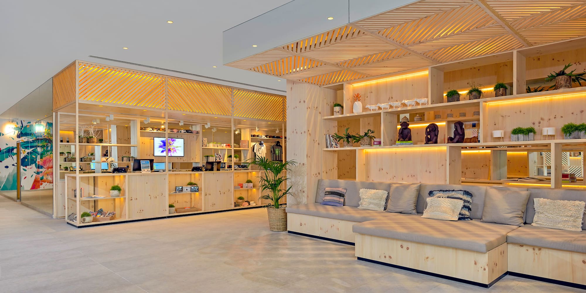 a room with a couch and shelves