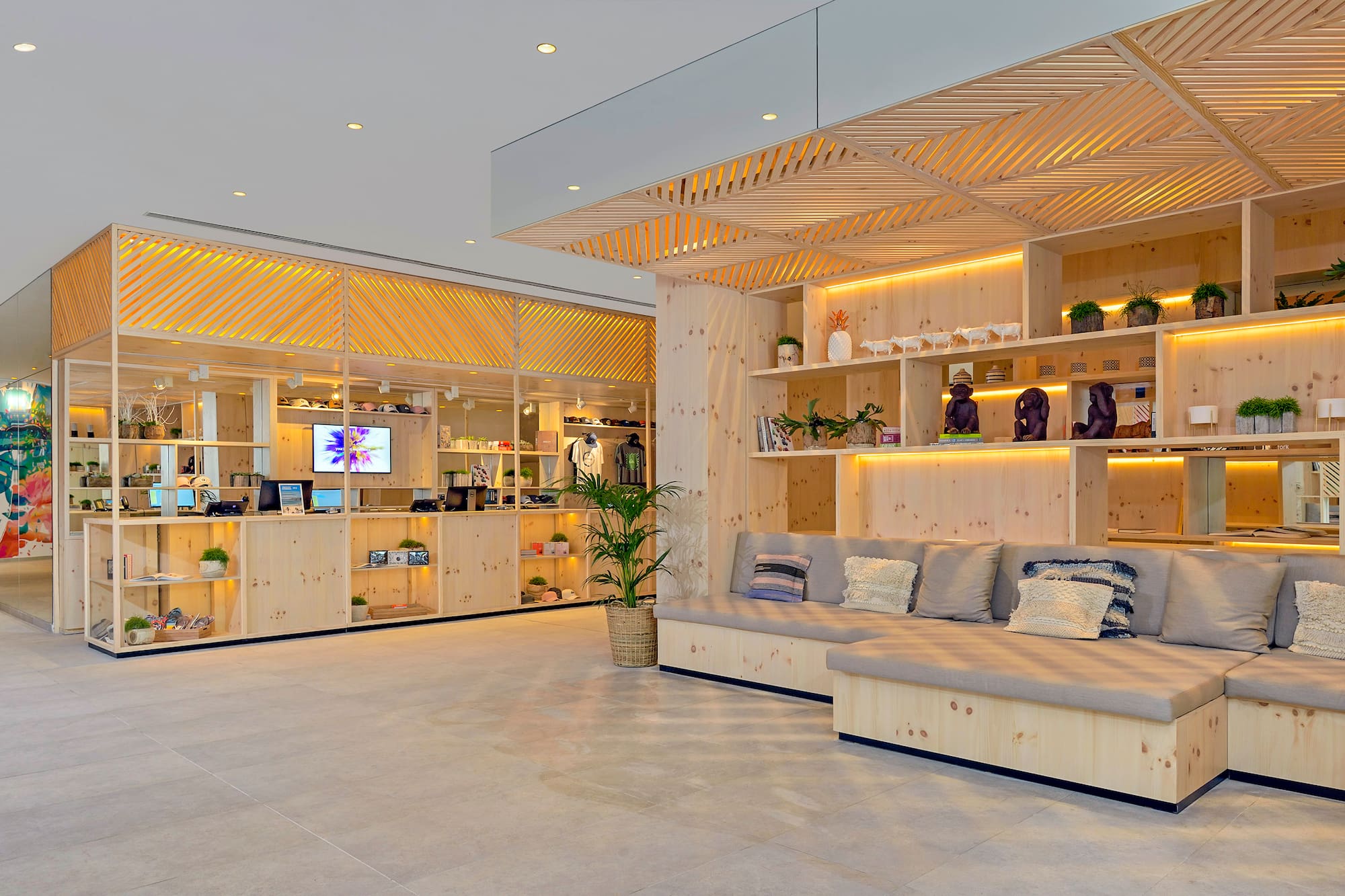 a room with a couch and shelves