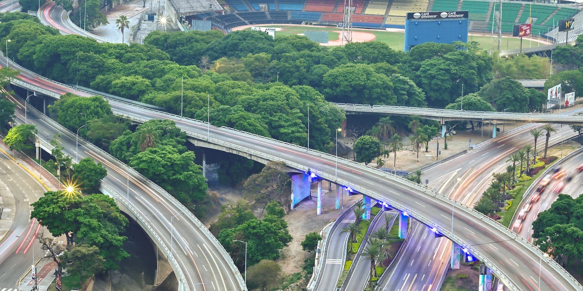 a highway with trees around it