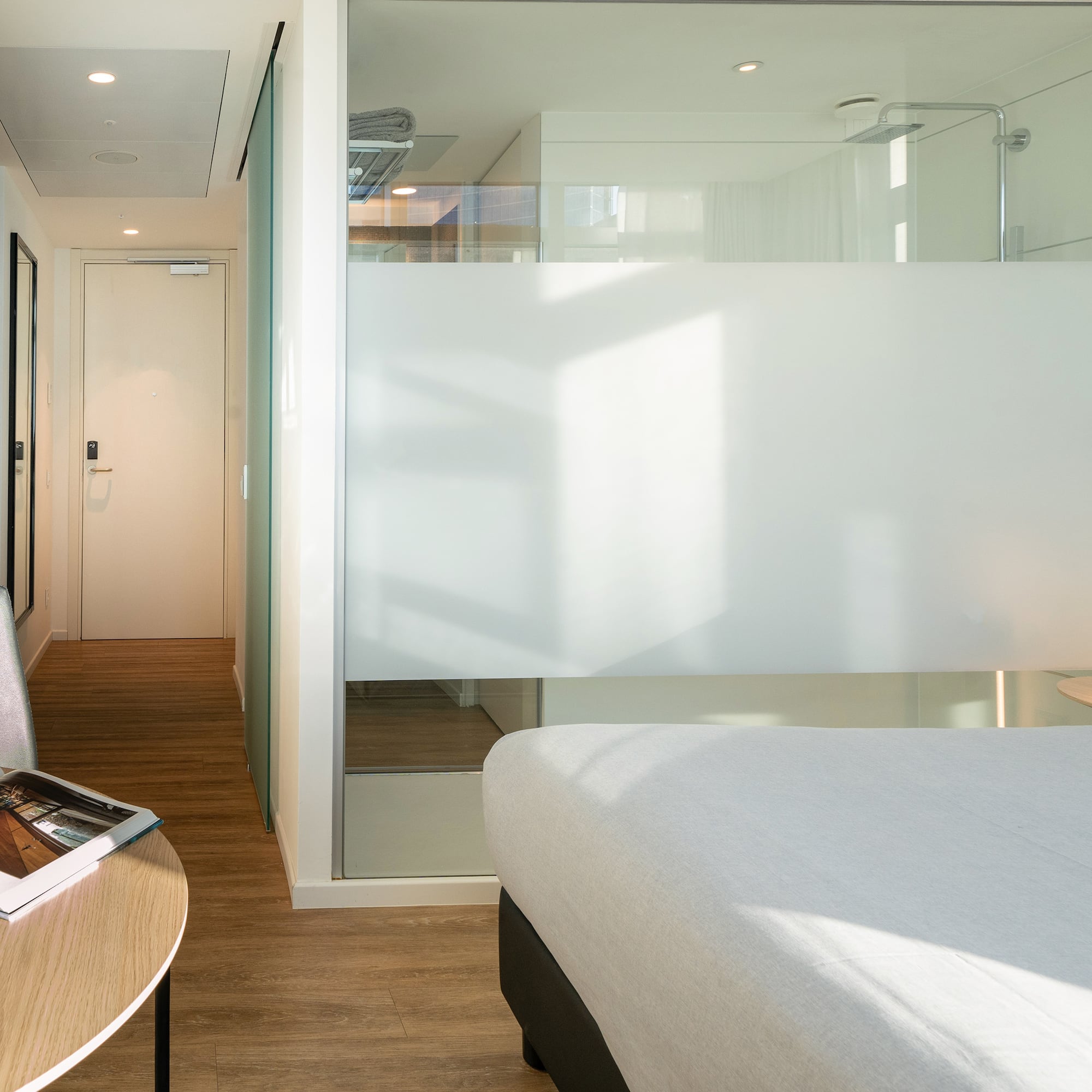 a room with a bed and a desk