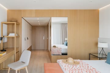 a room with a bed and a chair