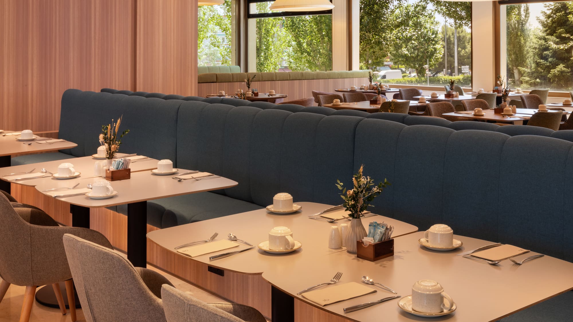 a restaurant with tables and chairs