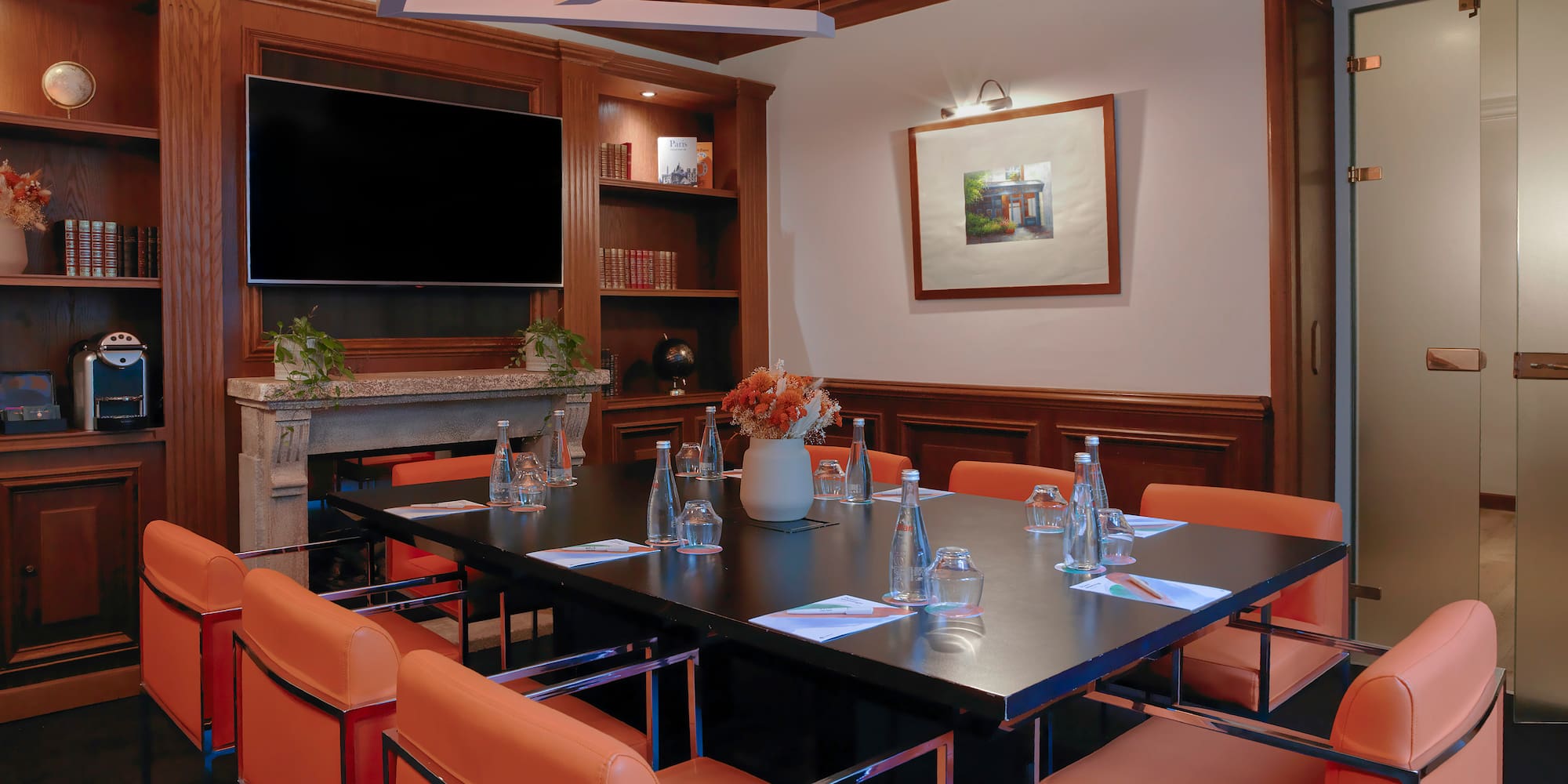 a room with a table and chairs