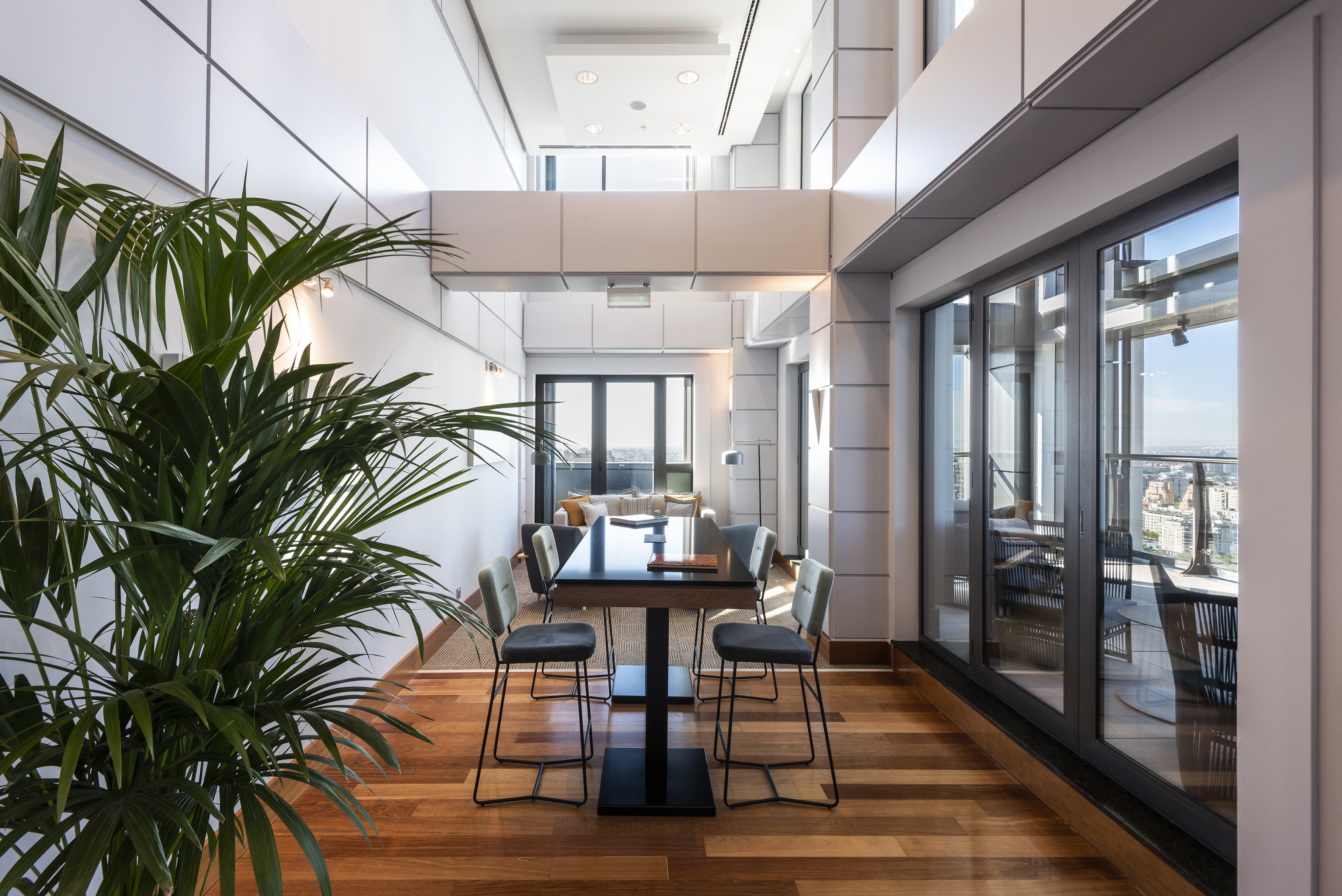 a room with a table and chairs