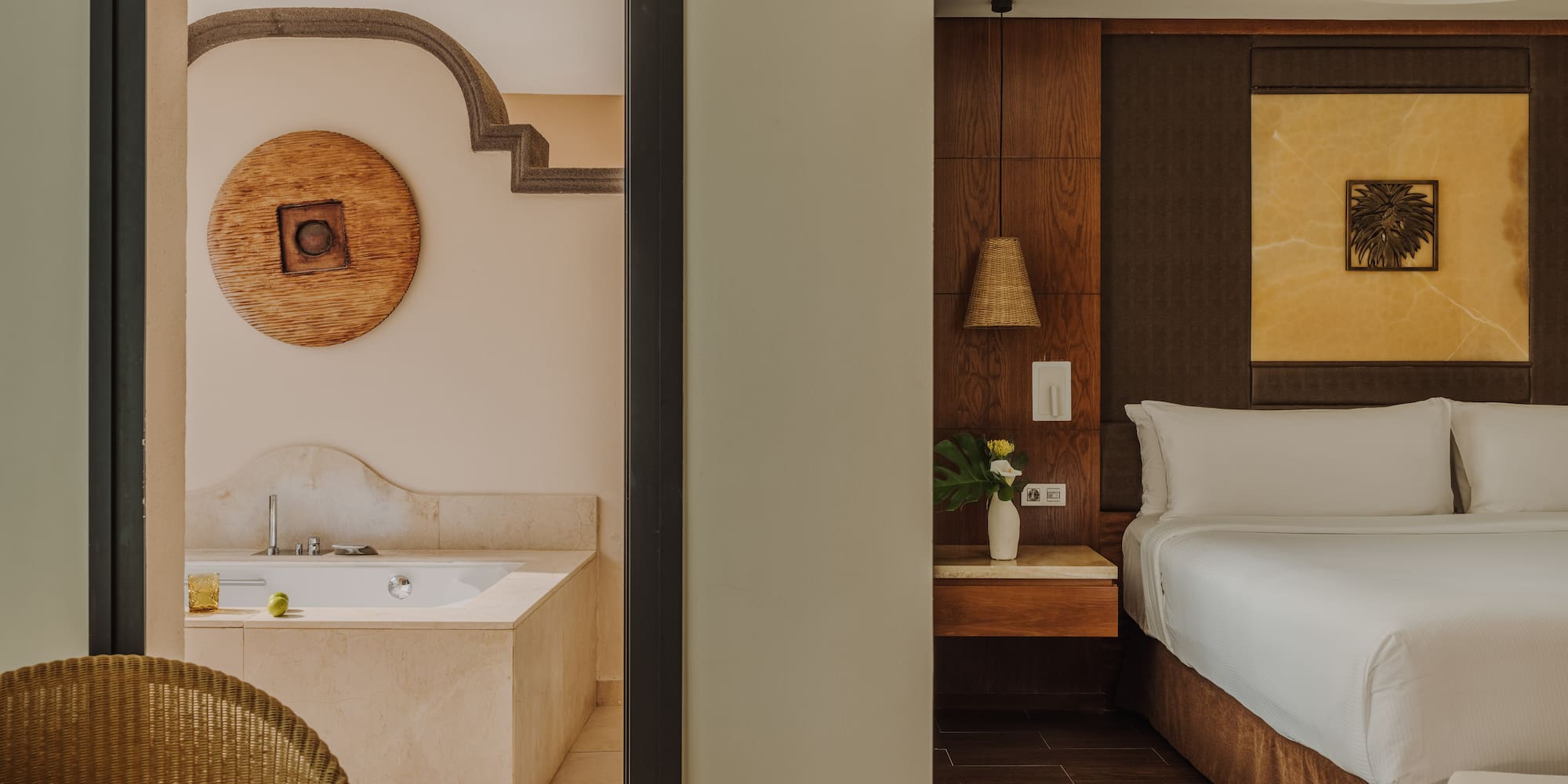 a room with a bed and a bathtub