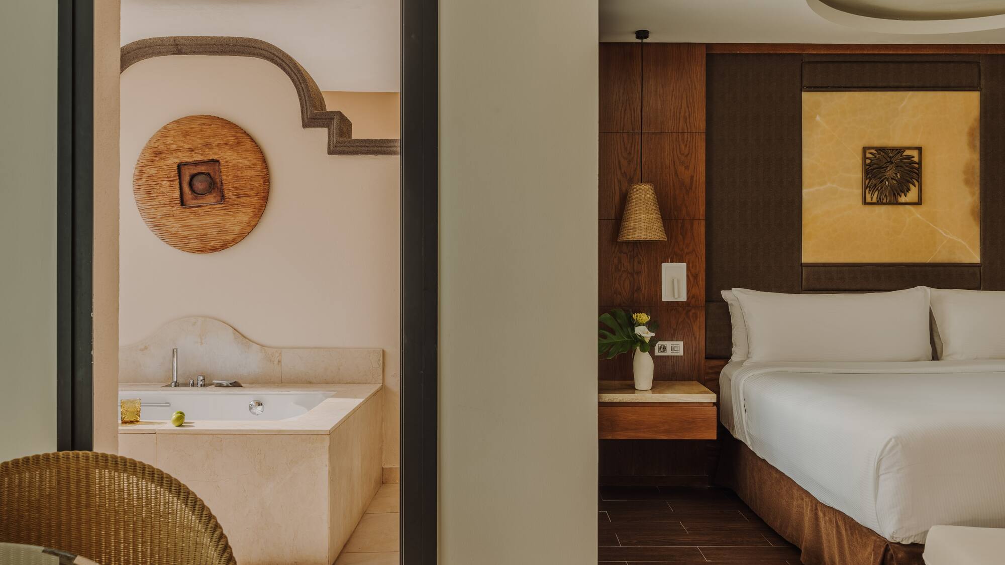 a room with a bed and a bathtub