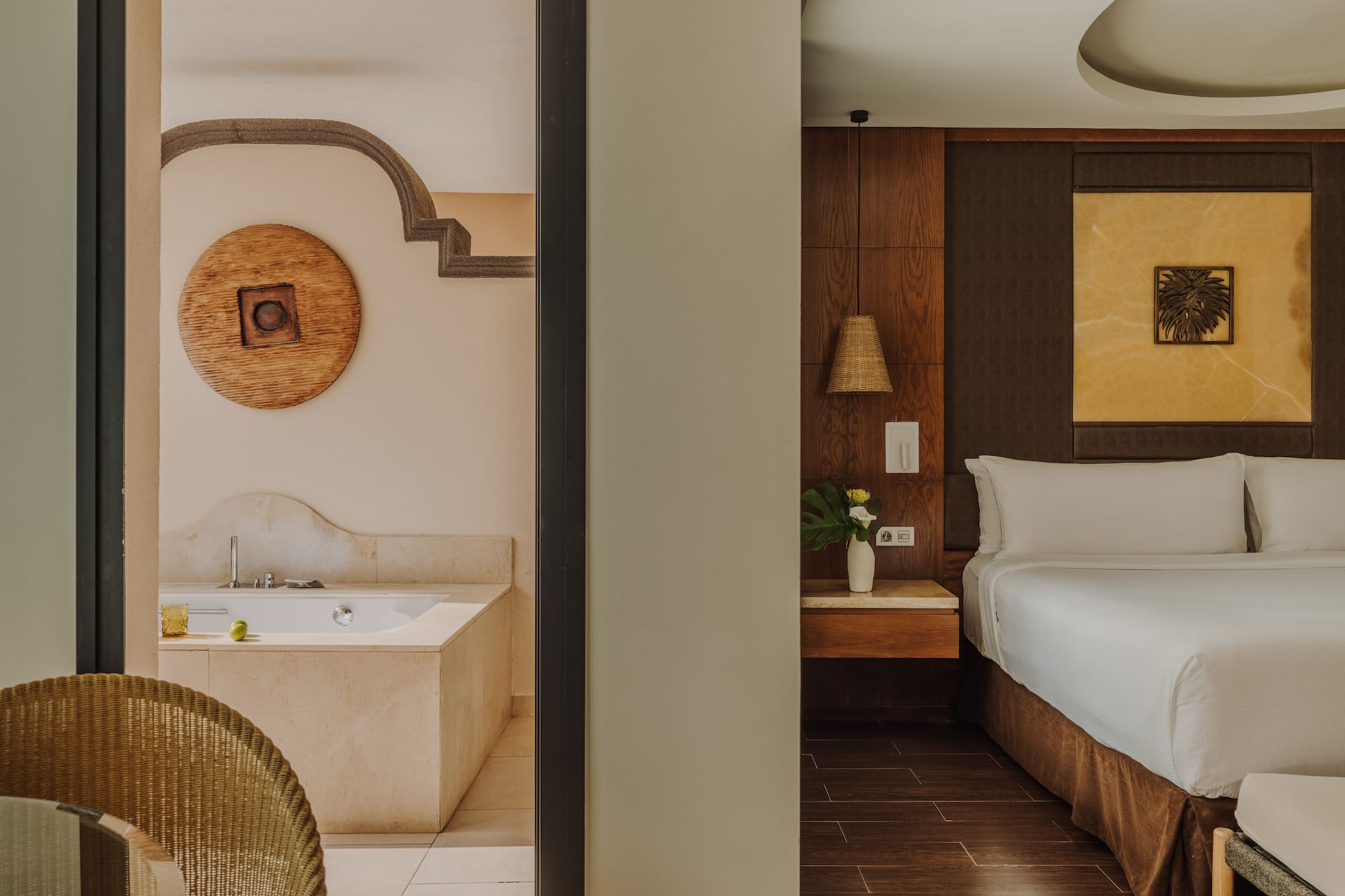 a room with a bed and a bathtub