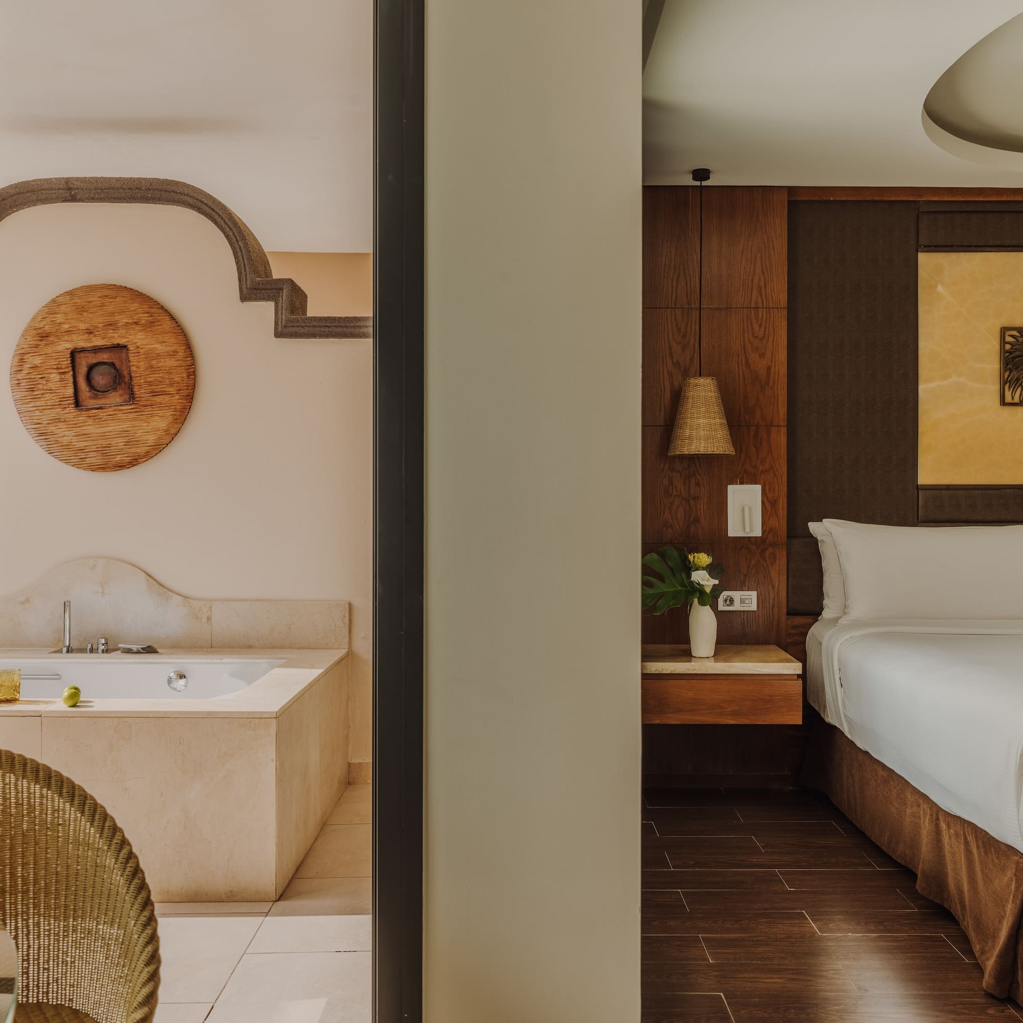 a room with a bed and a bathtub