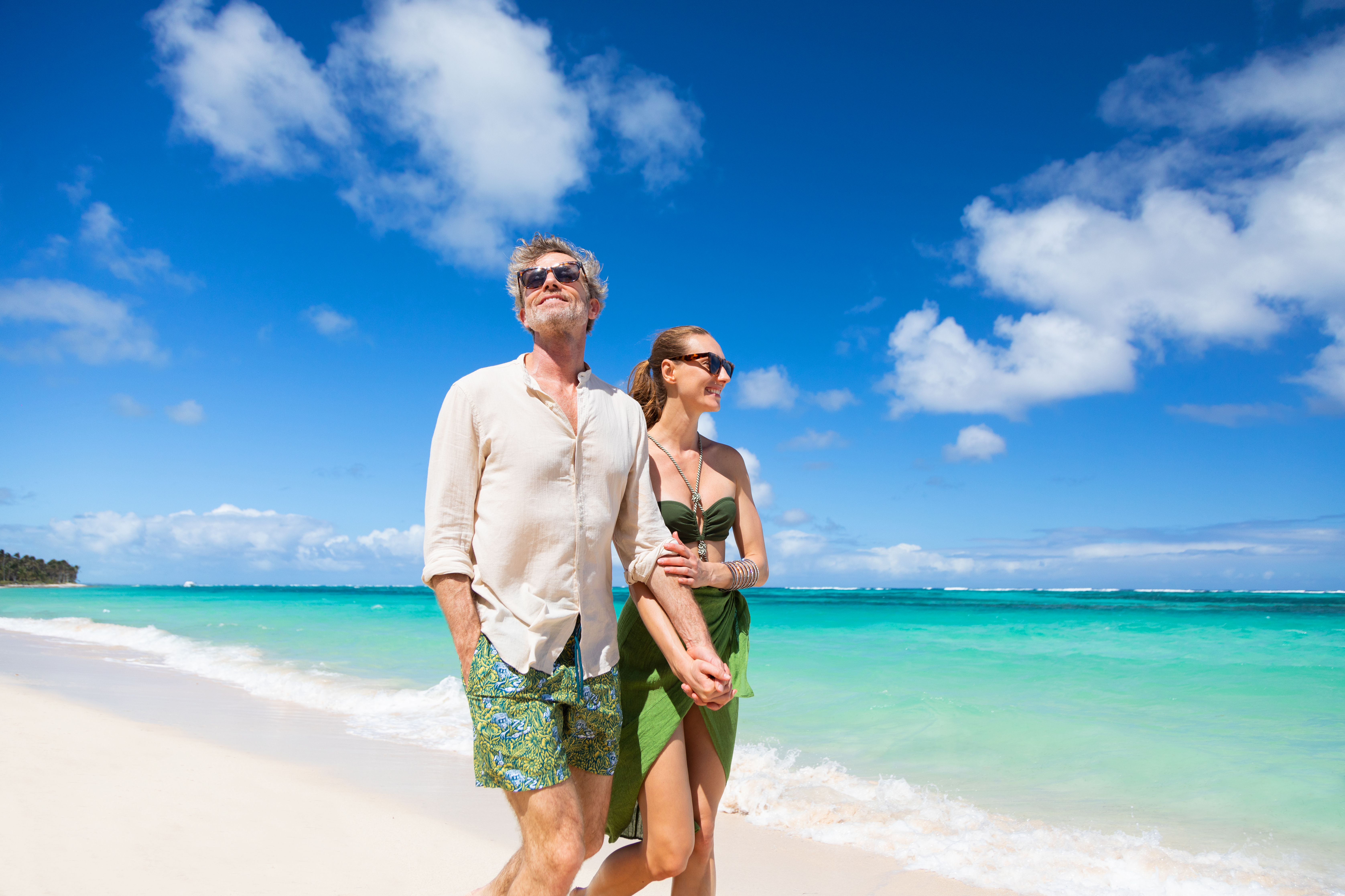 a man and woman on a beach