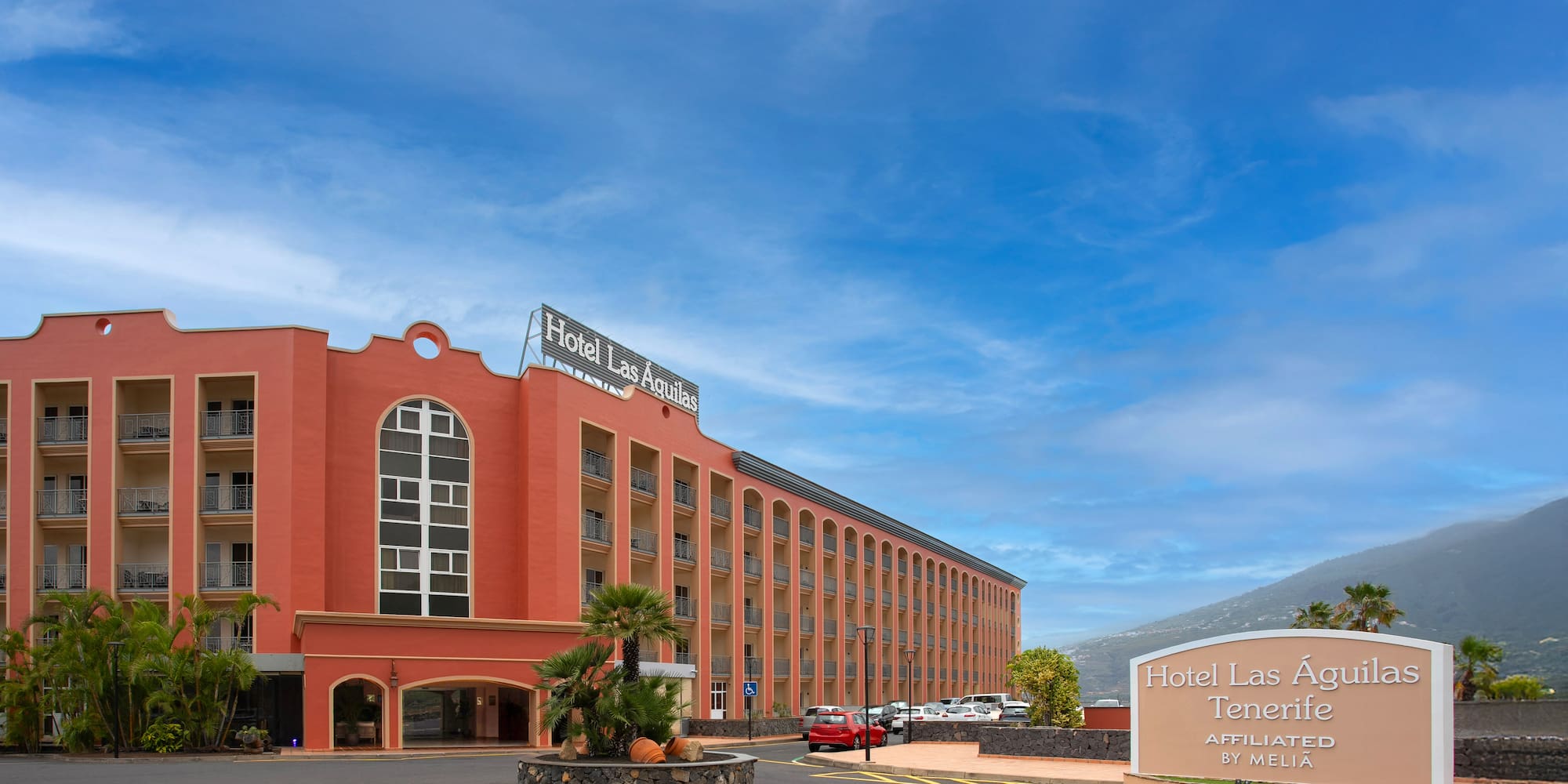a large building with a sign in front of it