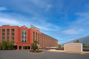 a large building with a sign in front of it