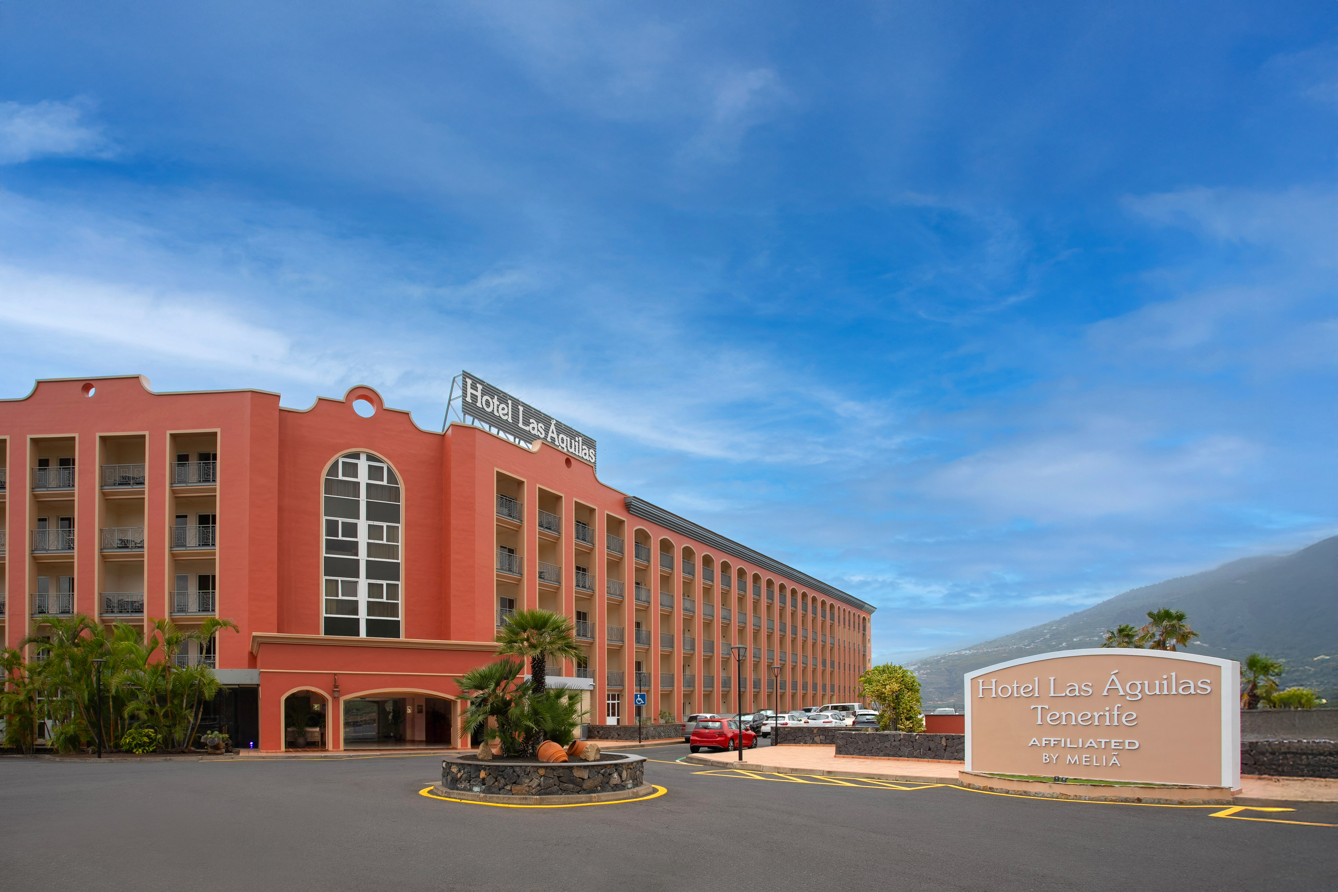 a large building with a sign in front of it