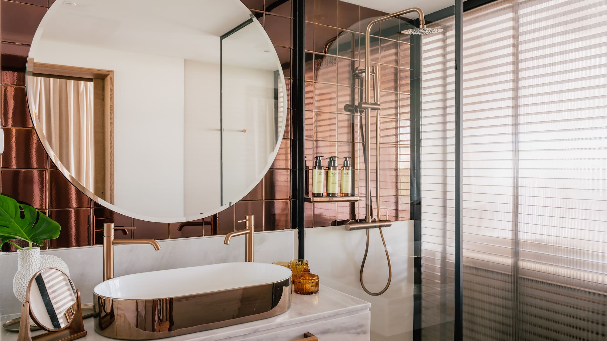 a bathroom with a sink and shower