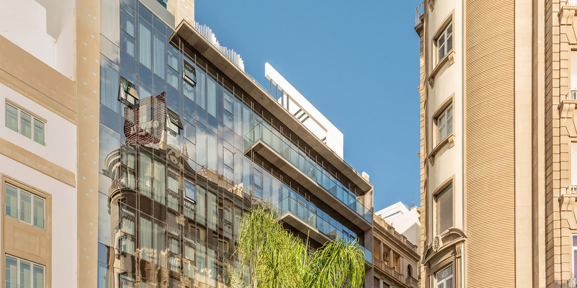 a group of buildings with trees