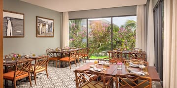 a restaurant with tables and chairs