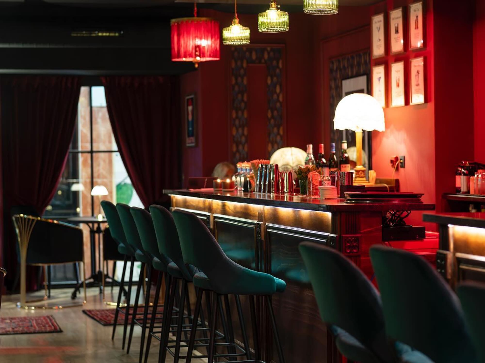 a bar with chairs and a table