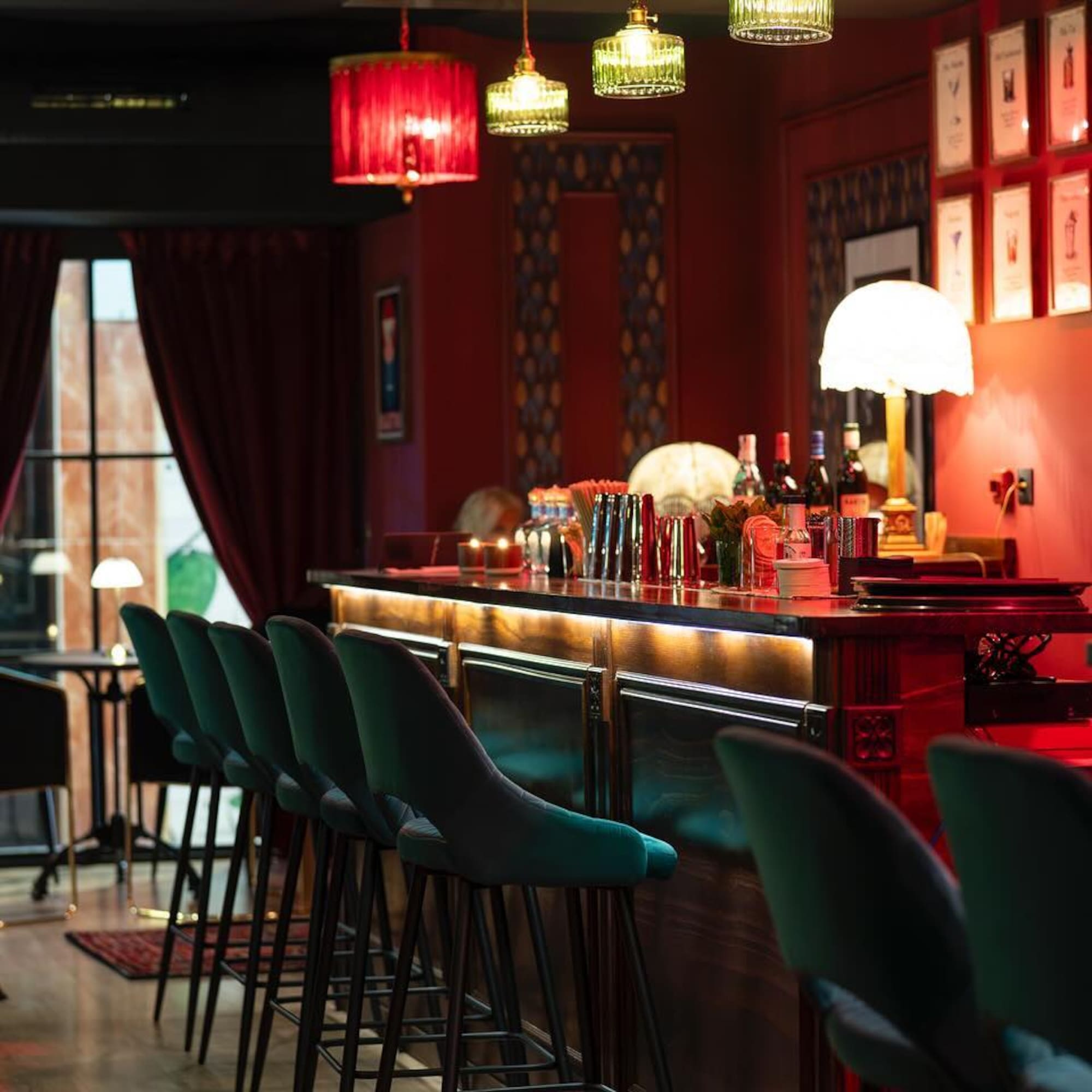 a bar with chairs and a table