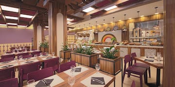 a restaurant with tables and chairs