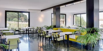a room with tables and chairs