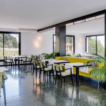 a room with tables and chairs