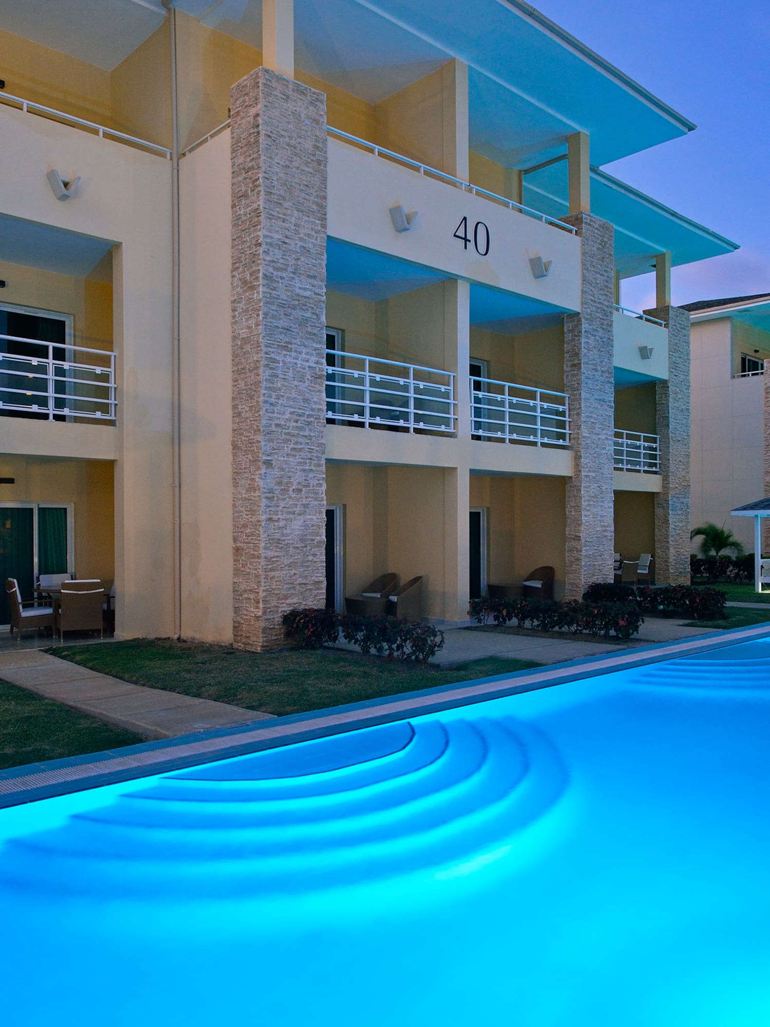 a pool of water next to a building