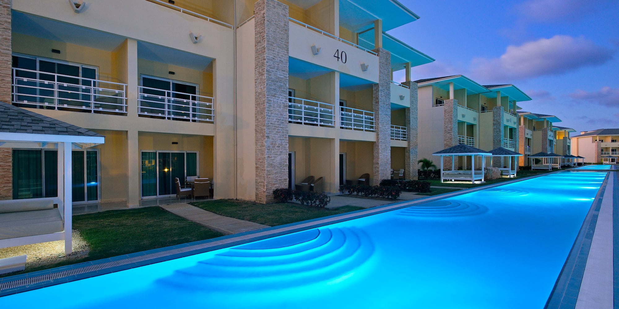 a pool of water next to a building