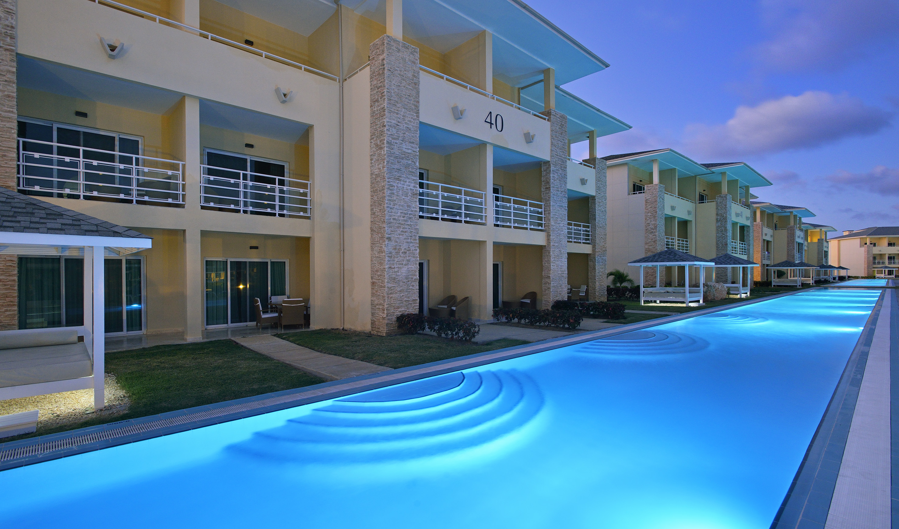 a pool of water next to a building