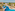 Tropical resort with large winding pool, palm trees, sunbeds, and ocean.