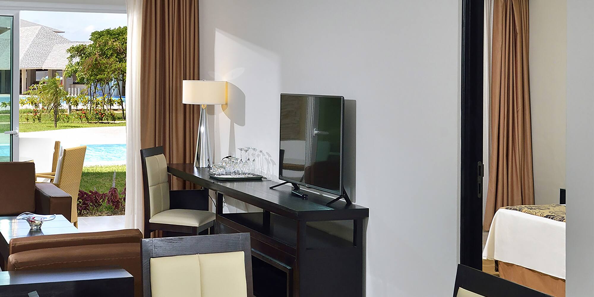 a room with a table and chairs