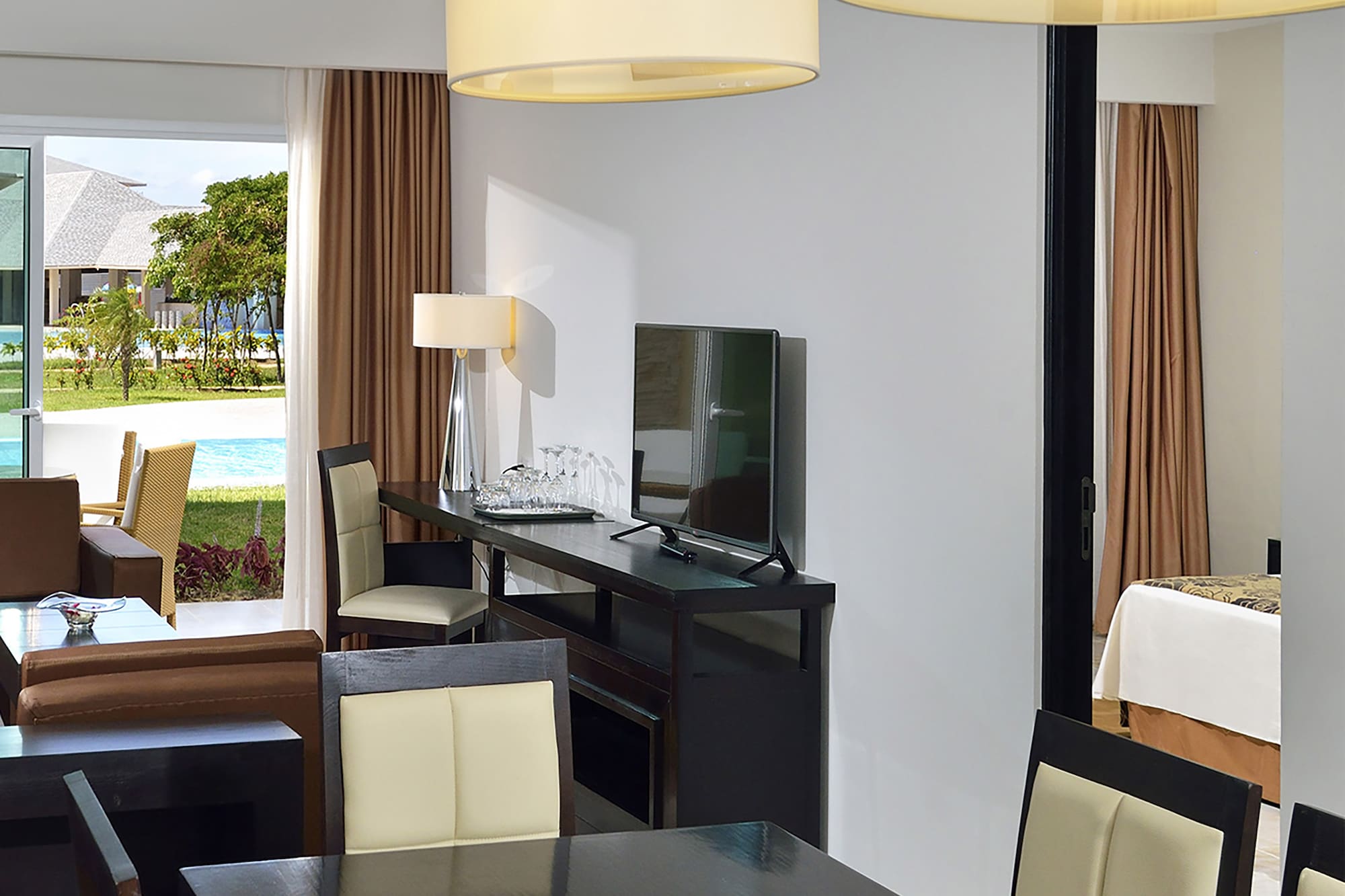 a room with a table and chairs