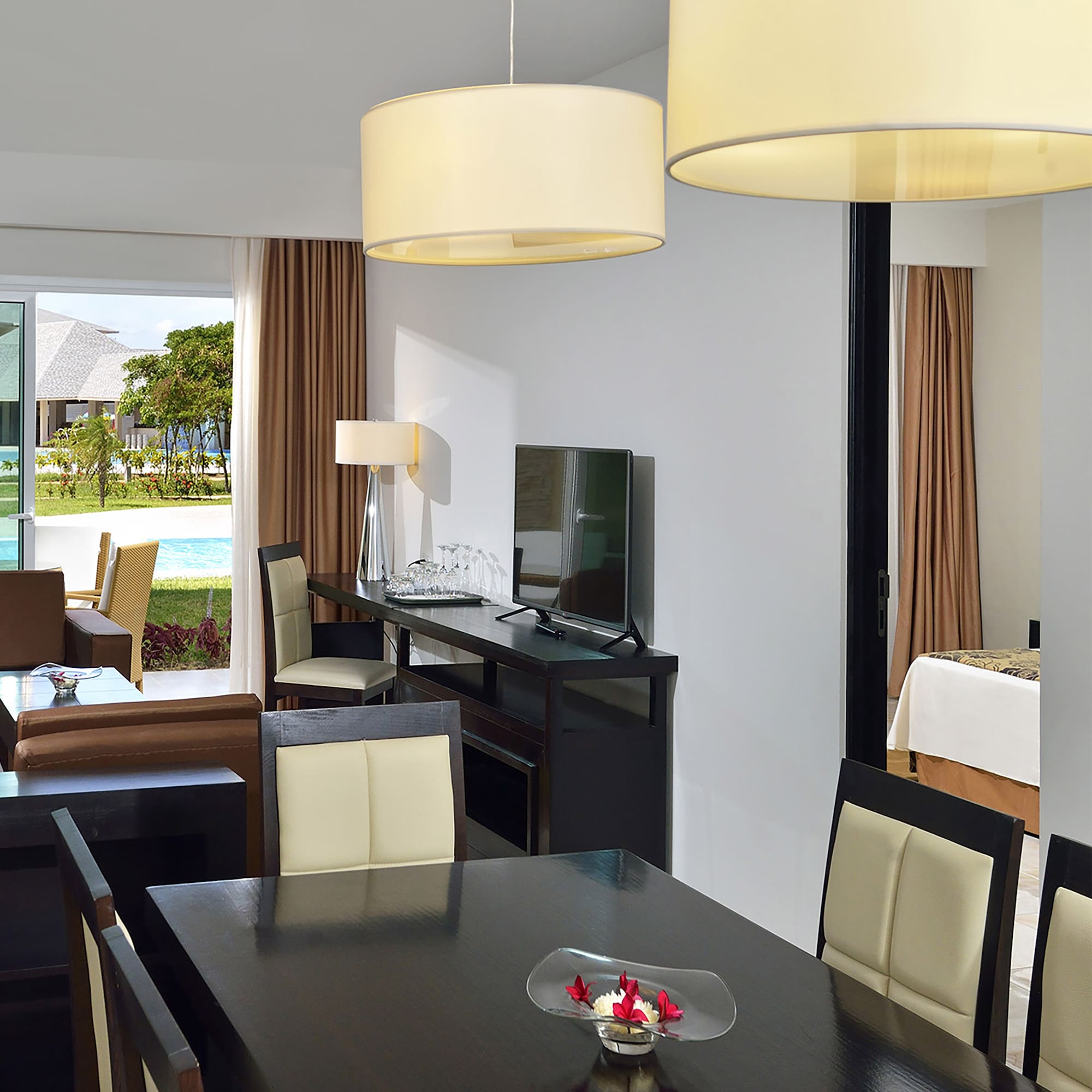 a room with a table and chairs