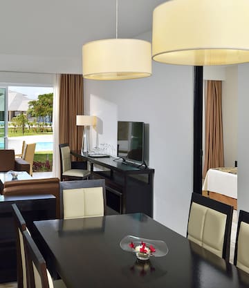 a room with a table and chairs