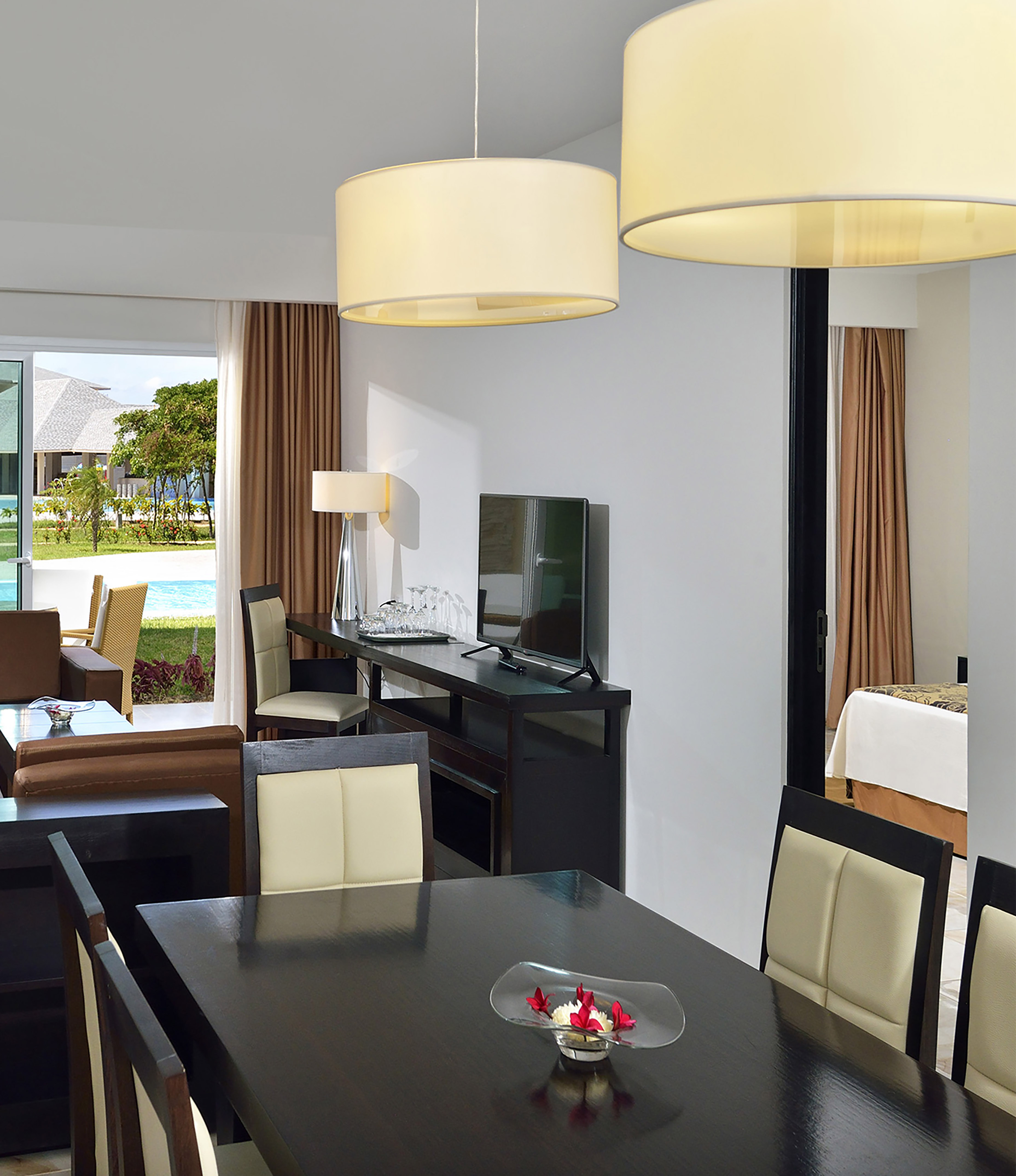 a room with a table and chairs