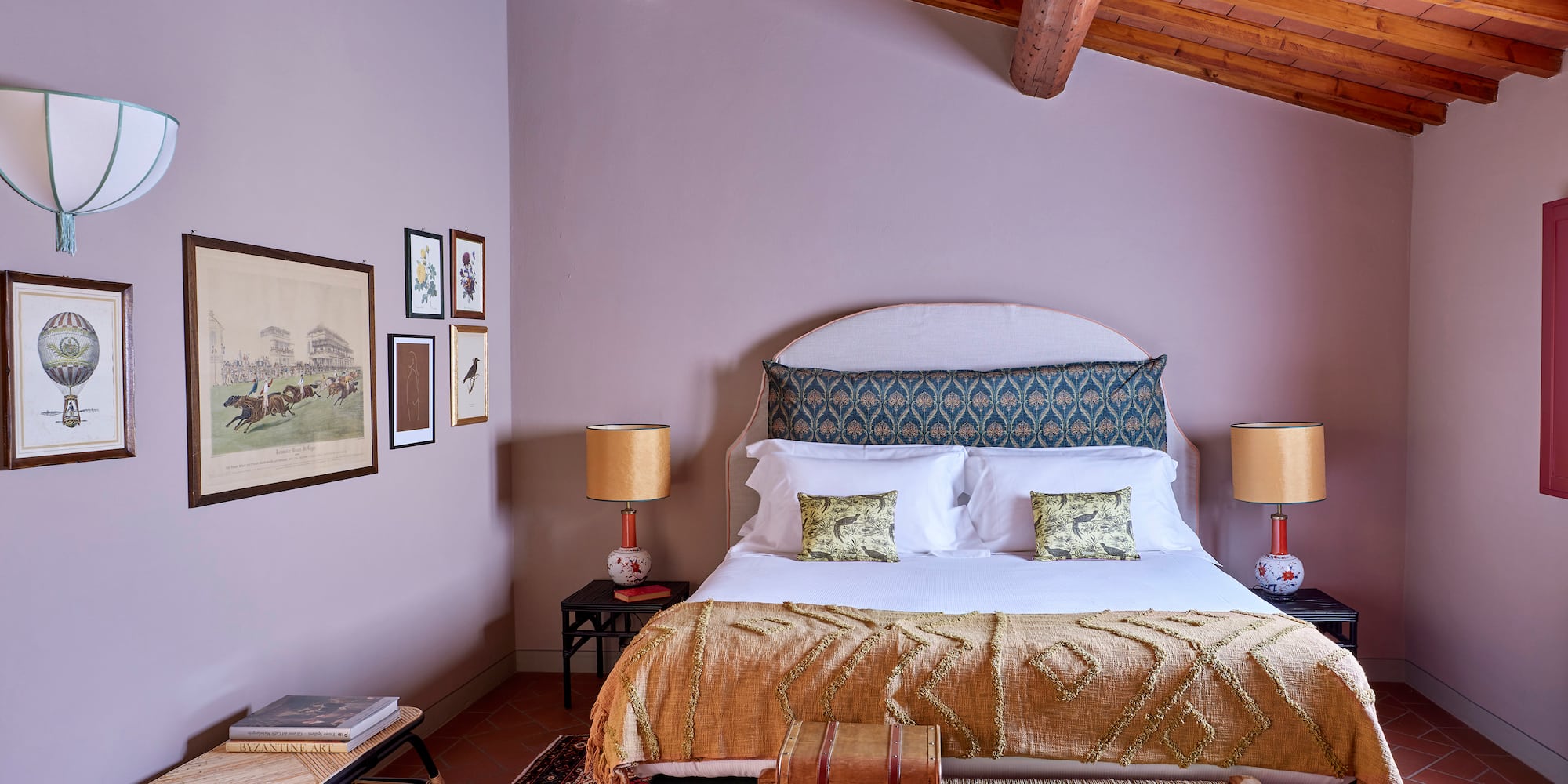 a bedroom with a bed and a rug