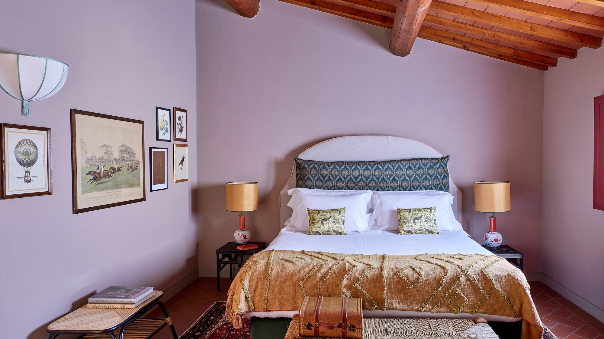 a bedroom with a bed and a rug