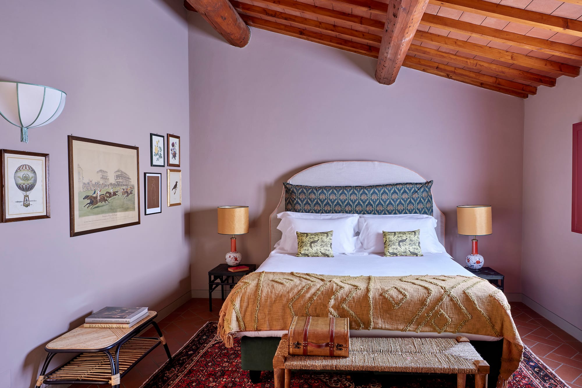 a bedroom with a bed and a rug