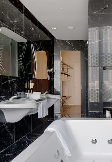 a bathroom with a sink and a bathtub