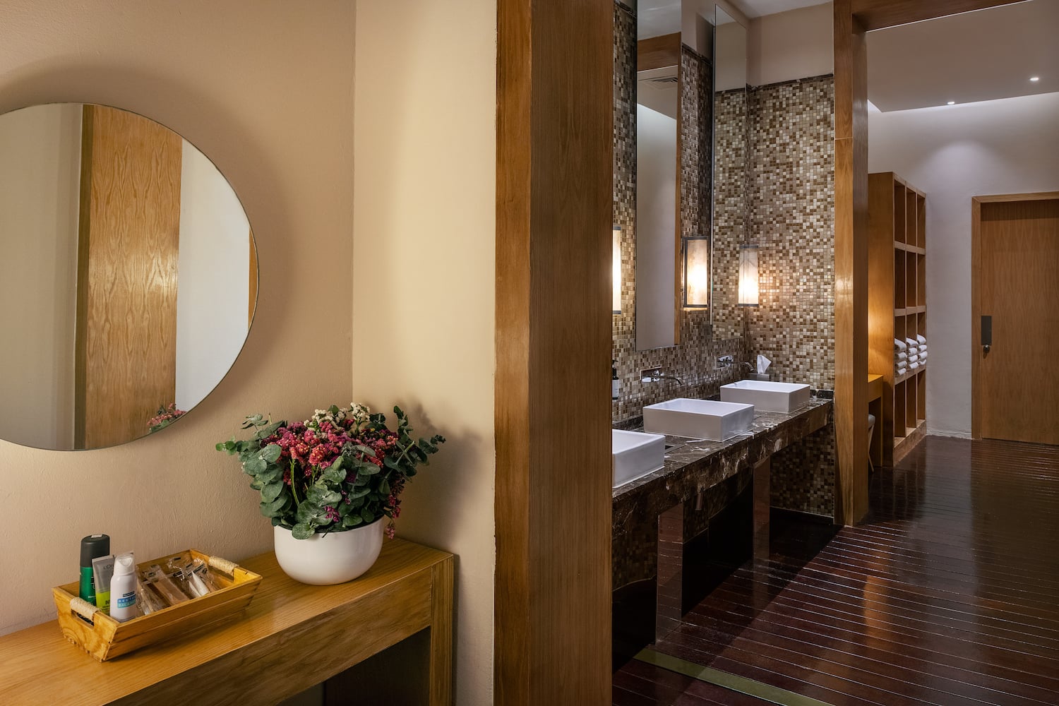 a bathroom with a mirror and sink